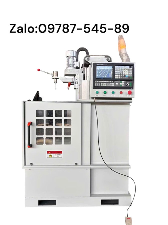 Máy tự động tôi tịnh tiến trục 1m